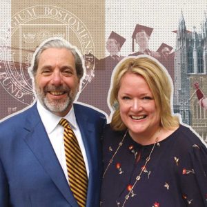 A man in a suit with a yellow striped tie and a woman in a navy blouse stand smiling together. In the background, paying it forward is emphasized through images of graduates in caps and gowns, alongside an academic building with Gothic architecture and the university seal.